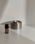 Asteroid Oil Burner Stainless Steel by Addition Studio