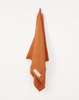 Burnt Orange Light Towel by FRAMA